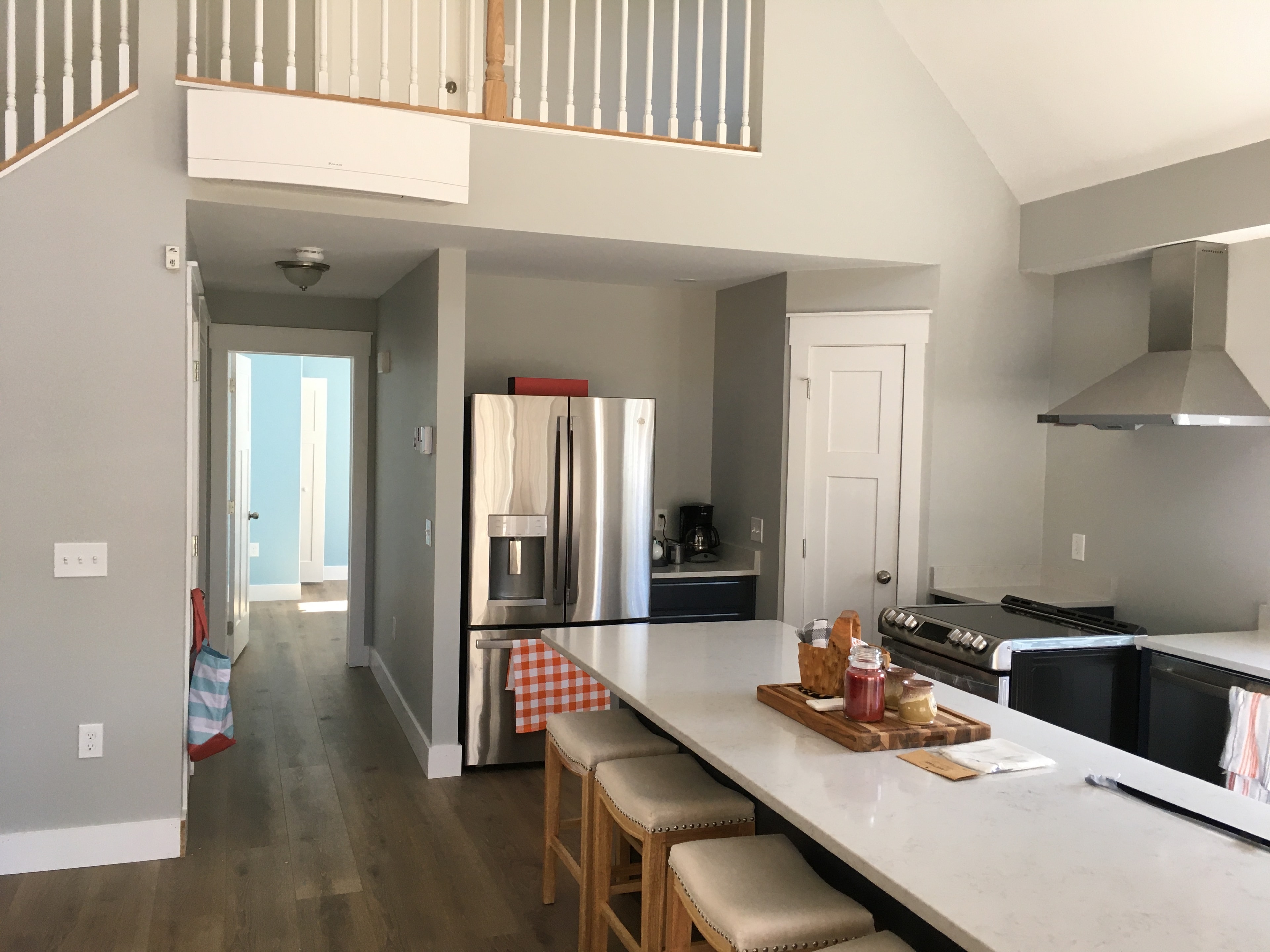 Kitchen with granite island and pendant lights