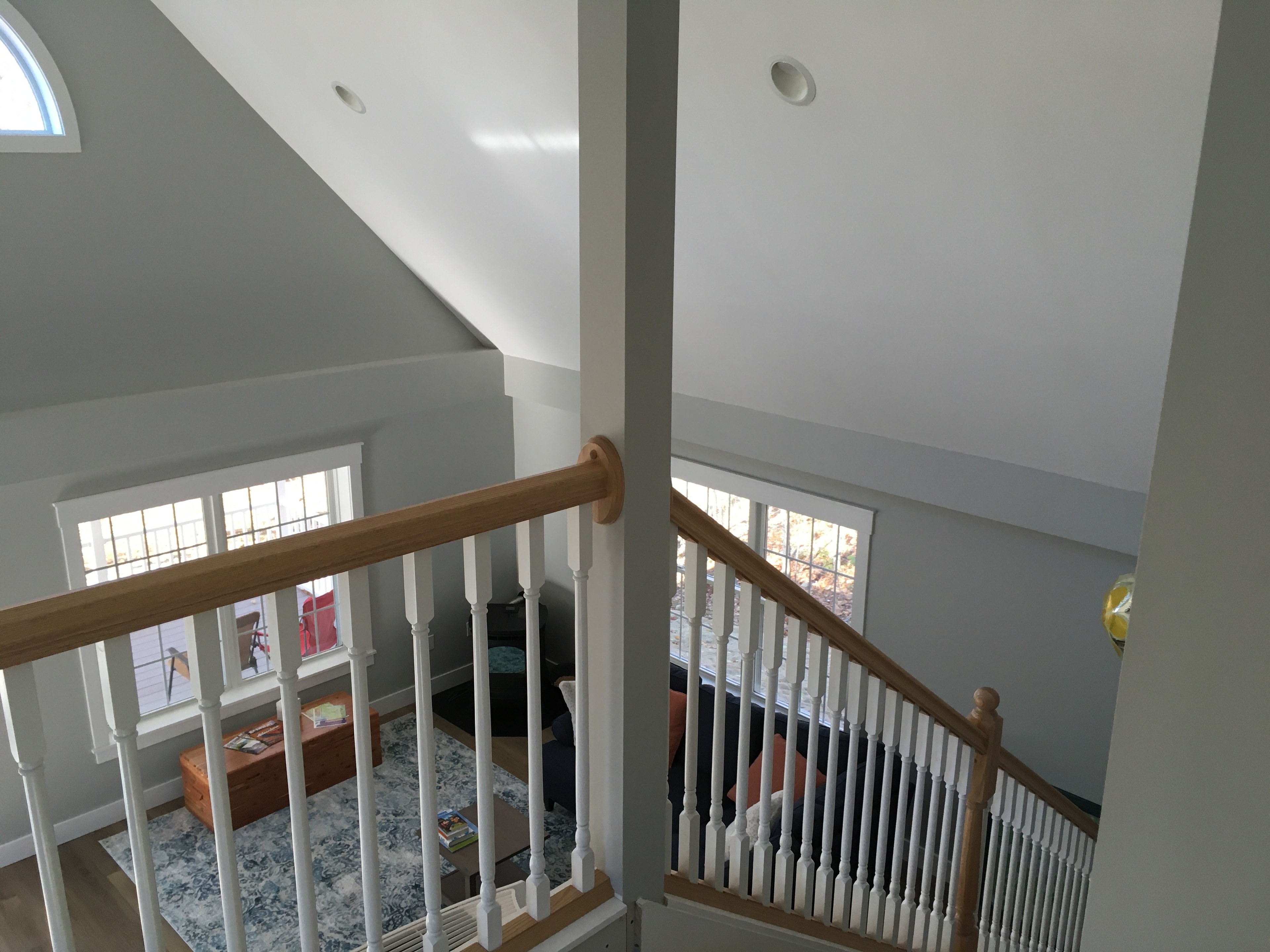 Interior stairwell with wood railings